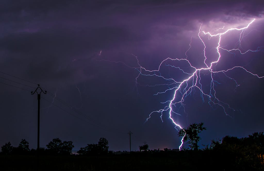 A stunning lightning strike captured during a thunderstorm in Flavin, Occitanie, France.